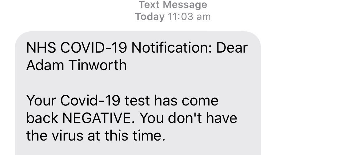 A UK government text message showing a Covid-19 test result. 