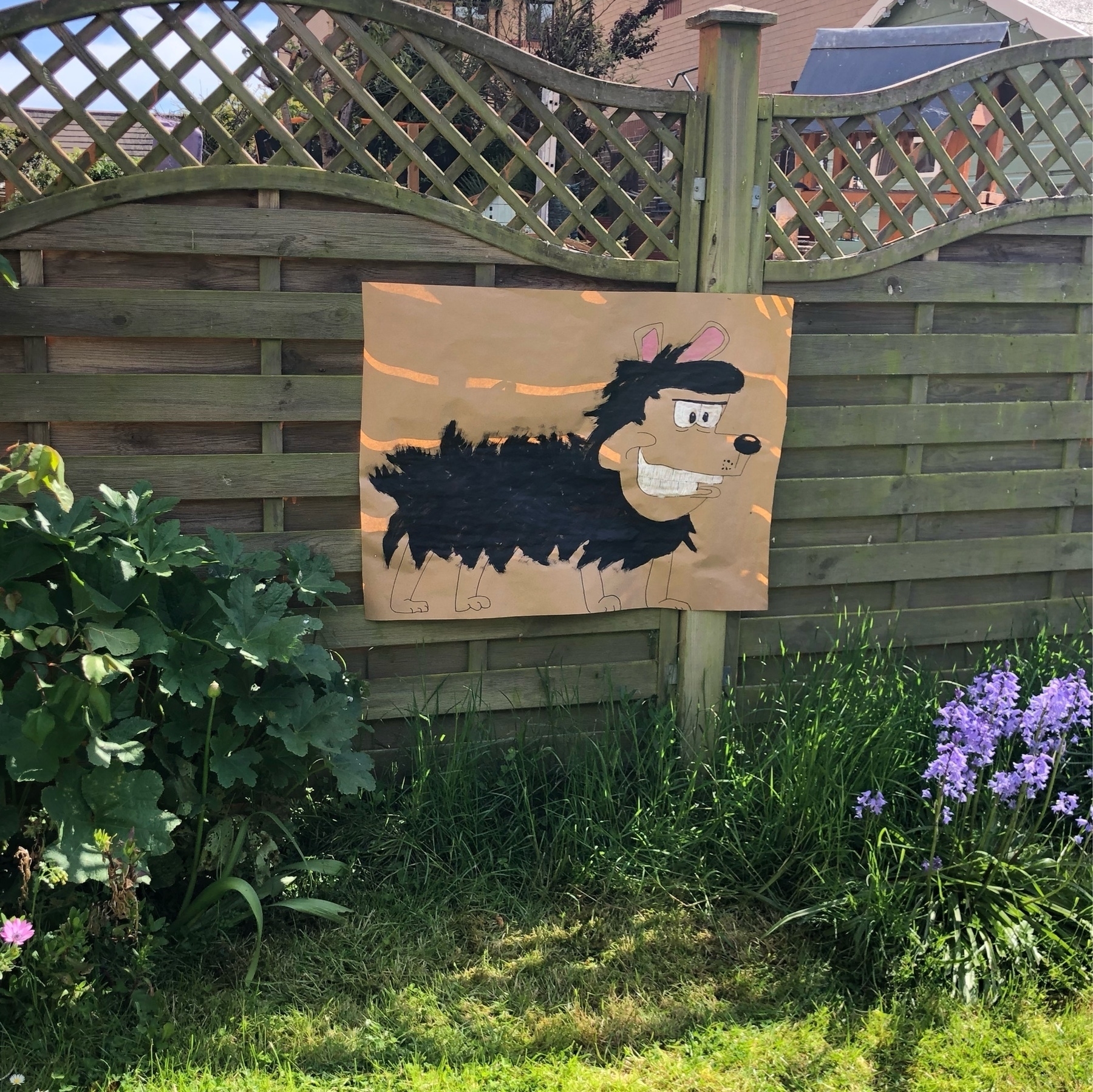 A drawing of the Beano's Gnasher, teady for a "pin the tail" game. 