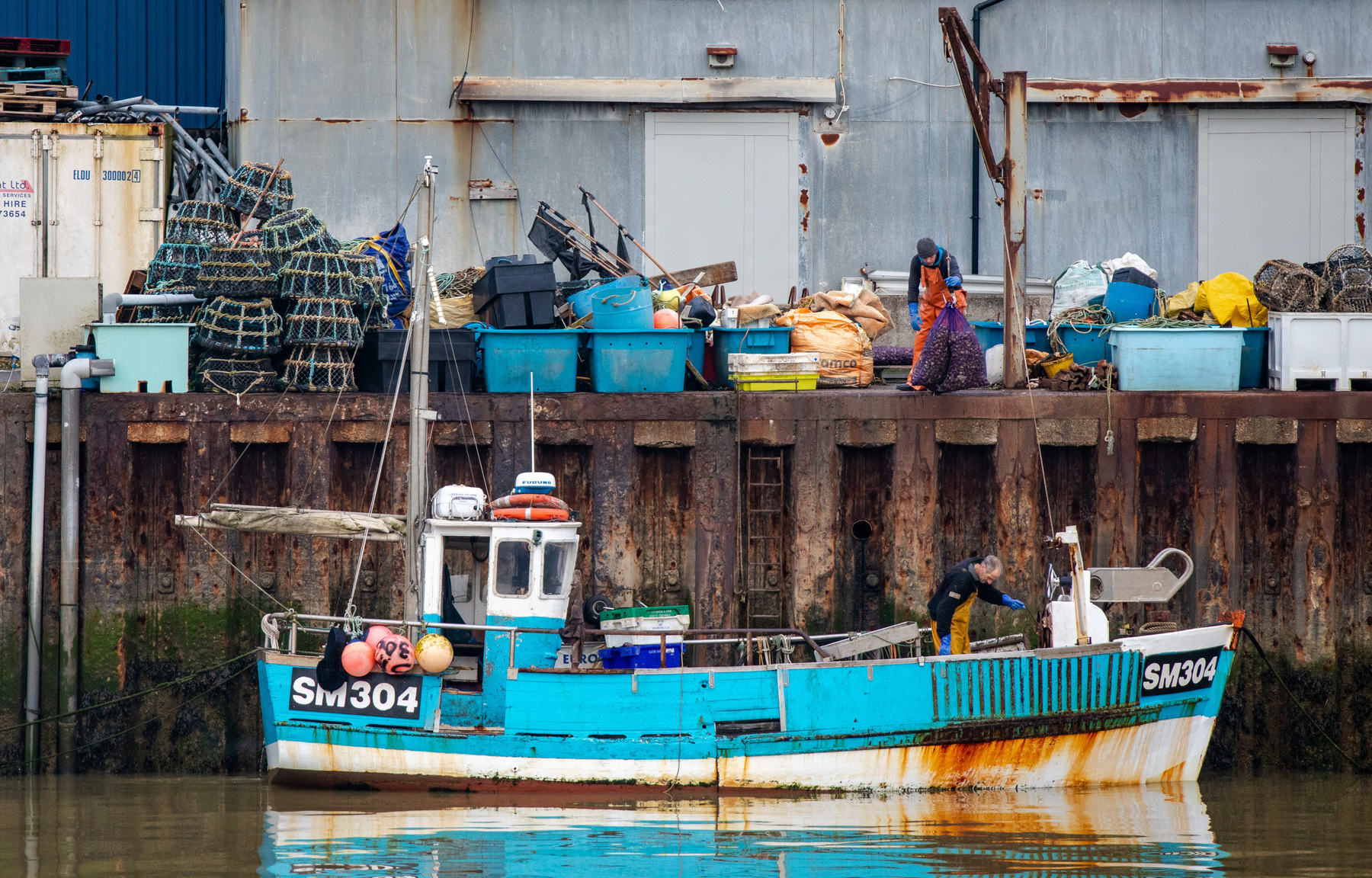 A fishing boat in the Adur bringing in a catch. 