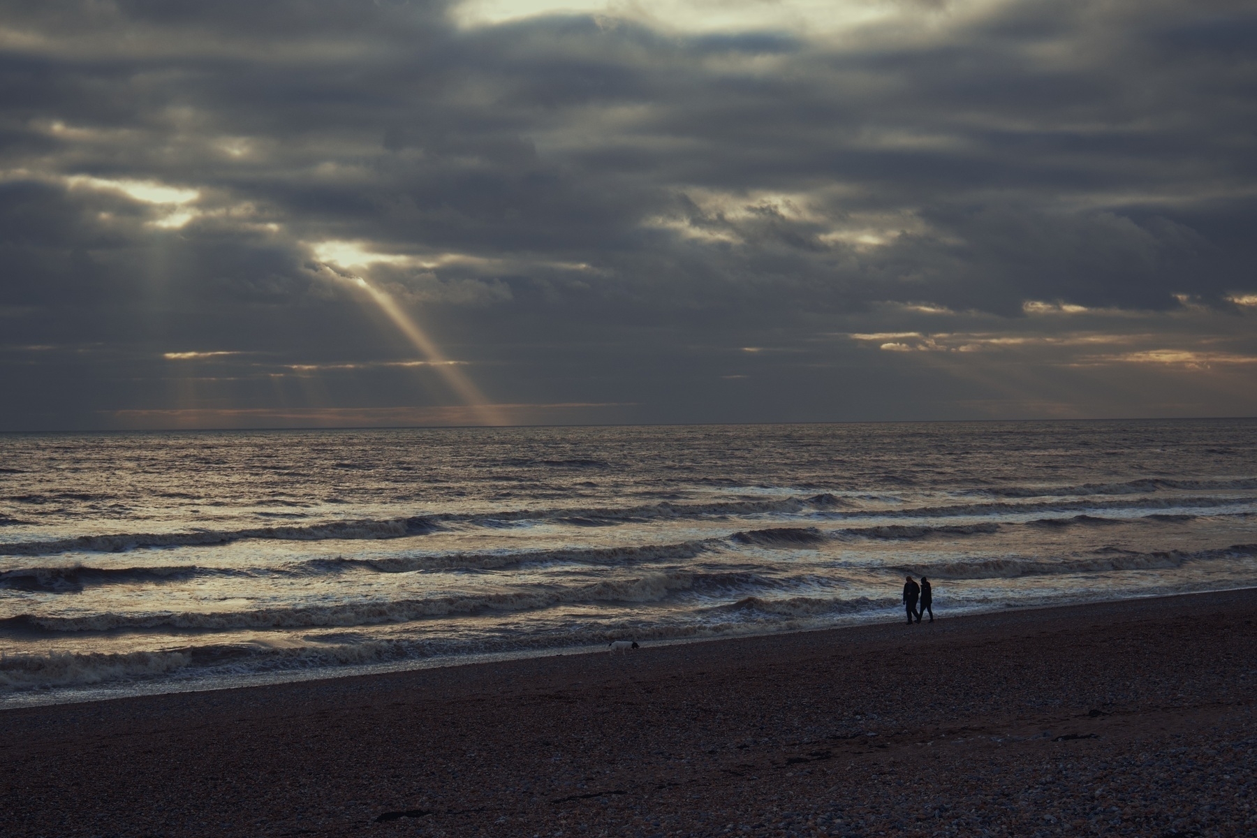 Light shining through a crack in the clouds over Shoreham Beach. 