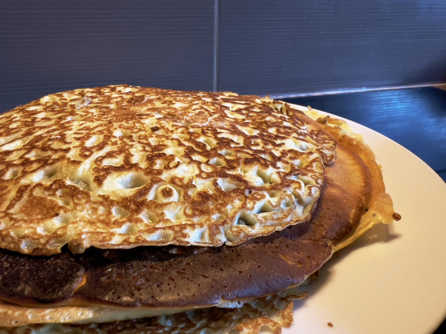 A stack of freshly-cooked pancakes